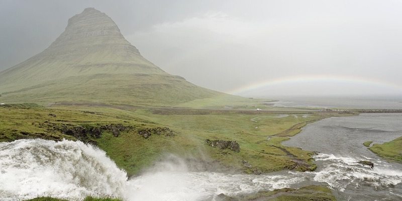 Kirkjufell and its waterfall under a rainbow, Snaefellsnes